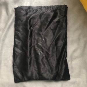 YSL black leather clutch